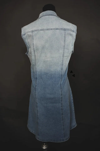A versatile piece from 2 Fly, the Denim Sweetheart Dress in light blue denim features a faded gradient design and extends to hip-length. Displayed on a black mannequin against a dark background, it showcases western arrow accents for a simple, casual style.
