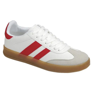 The Ness Striped Lace Up Flat Sneakers by Liam & Company are white, featuring red stripes and a light brown rubber sole. Their smooth design includes a suede-like texture on the toe cap, capturing the classic charm of striped sneakers.