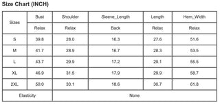A size chart displayed in inches for the Aria Loose V Neck Lightweight Summer Women's Top by Pretty Bash, showing measurements for bust, shoulder, sleeve length, length, and hem width for sizes S, M, L, XL, and 2XL. The chart indicates that the material has no elasticity and features lightweight woven fabric with Dolman sleeves for a relaxed fit.